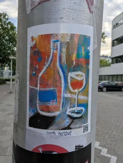 Street sticker A rectangular sticker displaying an expressive, colorful painting of a wine bottle and glass. Outlined in white and blue chalk-like strokes, the bottle features a blue label against a vibrant background of red, orange, and yellow. A QR code and the name 'erik berkhof' are printed at the bottom.