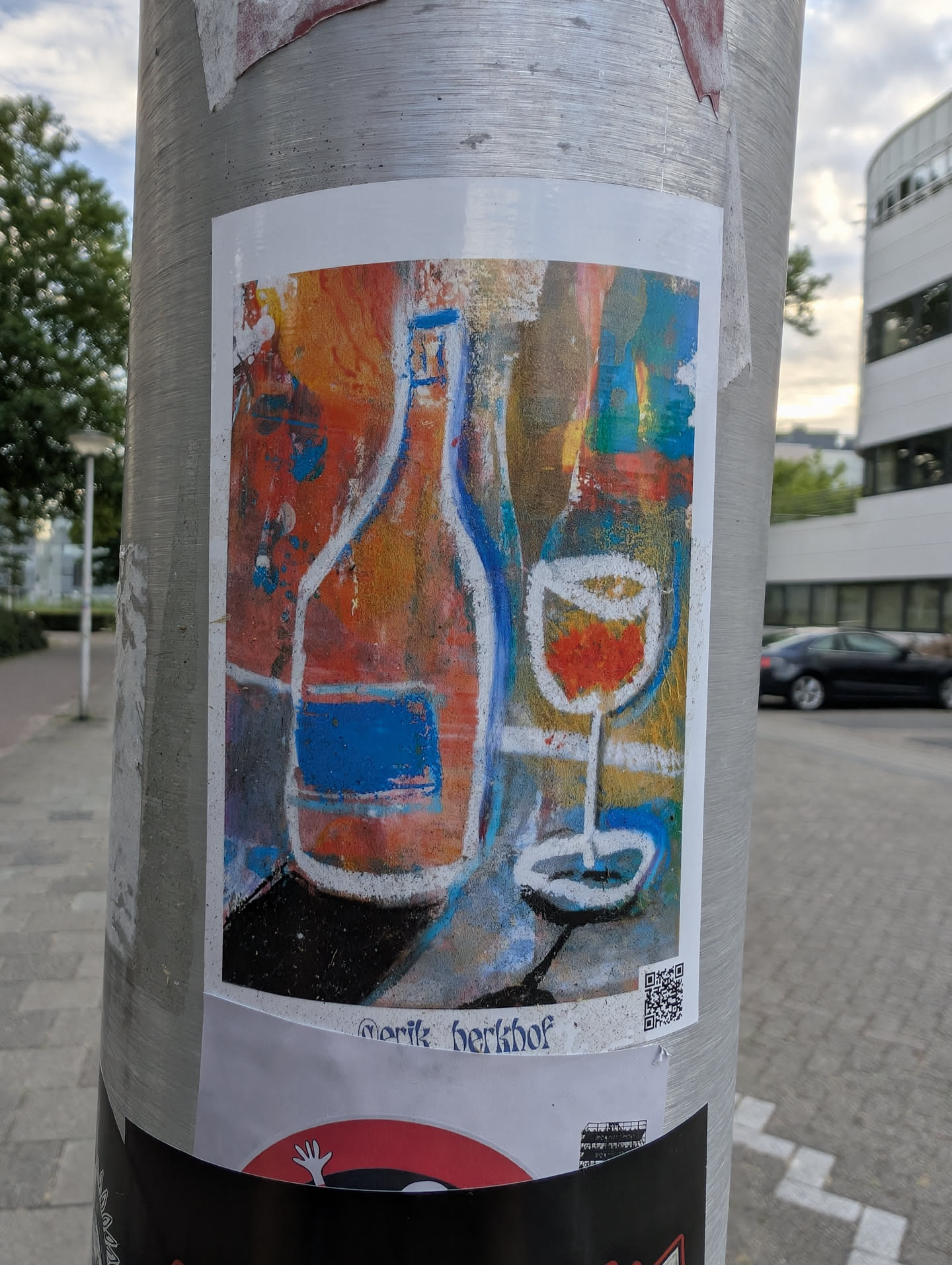 A rectangular sticker displaying an expressive, colorful painting of a wine bottle and glass. Outlined in white and blue chalk-like strokes, the bottle features a blue label against a vibrant background of red, orange, and yellow. A QR code and the name 'erik berkhof' are printed at the bottom.