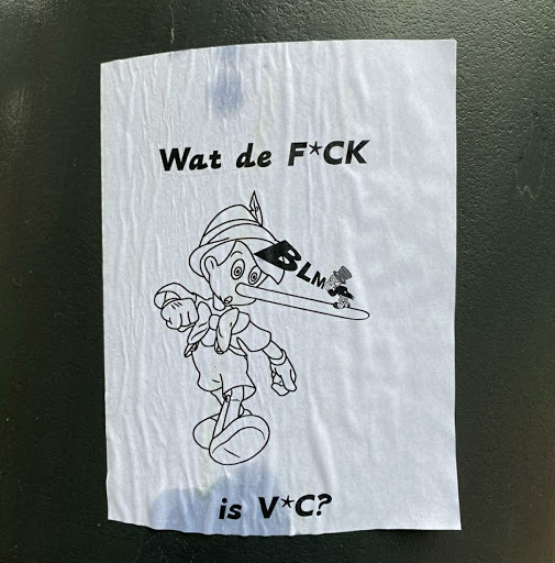 Street sticker A sticker featuring a drawing of Pinocchio with an extremely long nose. On the nose, it says BLM. The text on the sticker says "Wat de F*CK is V*C?"