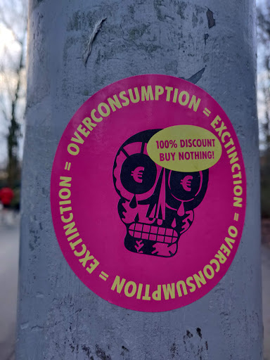 Street sticker Amsterdam OVERCONSUMPTION II EXCTINCTION = &euro; 100% BUY NOTHING! DISCOUNT &euro; = EXCTINCTION II OYERCONSUMPTION