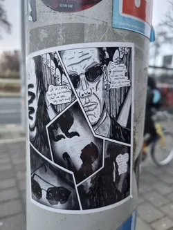 Street sticker This sticker shows a comic-style illustration in black and white. A man with sunglasses is the main focus, and there are several smaller panels that seem to tell a story. The text in the speech bubbles is mostly illegible, but some words are visible.  The style is reminiscent of graphic novels or manga.