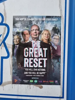Street sticker A sticker depicting a poster about the Great Reset conspiracy theory. It features prominent figures and the quote "You will own nothing, and you will be happy." Logos of several political parties are visible at the bottom. 