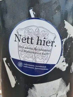 Round sticker with a crest and text in German.  It promotes the Wallersteer Kerb. Social media handles are included at the bottom.