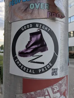 Street sticker A square white sticker featuring a circular black emblem. Inside, a purple combat boot is positioned above a black 'Z' symbol. The circular border contains the text 'GOOD NIGHT' and 'IMPERIAL PRIDE' in white. A small QR code is located in the bottom right corner.