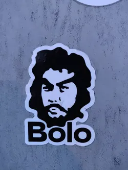 Street sticker A black and white sticker featuring a stylized portrait of a man with a beard and the name "Bolo" written below. The style is reminiscent of protest art or political posters.