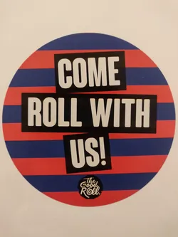 Street sticker Round sticker with red and blue stripes.  It has the text 'COME ROLL WITH US!' in a bold, sans-serif font. A smaller logo is at the bottom that says 'The Good Roll'.
