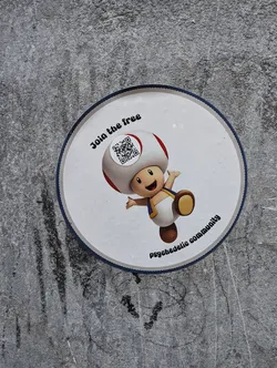 Street sticker Round sticker featuring Toad from Super Mario, a QR code, and the text "Join the free psychedelic community".