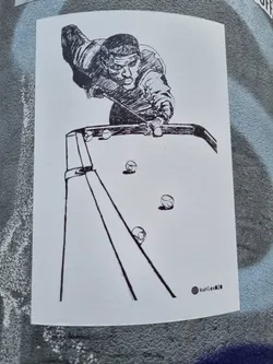 Street sticker This sticker features a black and white illustration of a person playing billiards, focusing on the player's concentrated stance and the strategic positioning of the balls.  The artist's signature, "kun1exd," is visible in the bottom right corner. 