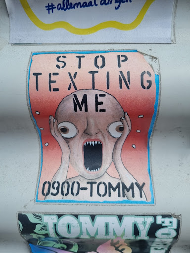 Street sticker Amsterdam STOP TEXTING ME 0900-TOMMY