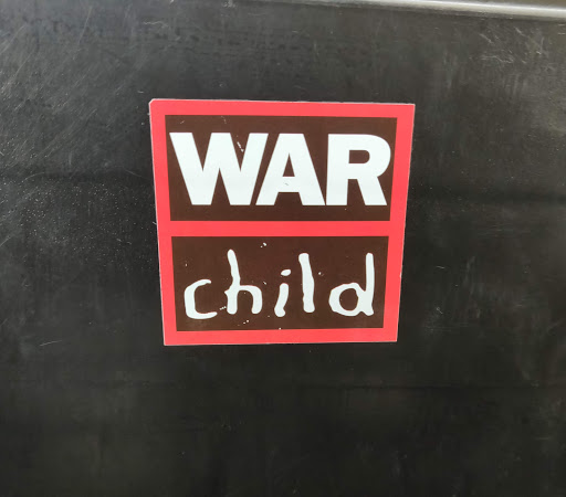 Street sticker Amsterdam WAR child