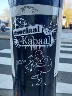 Street sticker A sticker featuring an illustration of a man blowing into a megaphone with the text 'asociaal Kabaal' which translates to 'antisocial noise' in Dutch. The word 'Haitsjuu' is written in smaller text, seemingly the artist's signature. The sticker is dark-colored with white illustrations and text.