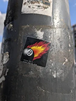 This sticker shows an 8-ball with flames emanating from it on a black square background. The text "Schlag die 8 since 2020 bc JFJB" is printed at the bottom of the sticker.
