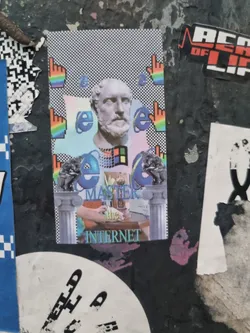 Street sticker A sticker featuring a bust of a Greek philosopher superimposed with the Internet Explorer logo and other digital elements. The sticker has a retro aesthetic with pixel art and a color scheme reminiscent of the early internet era.