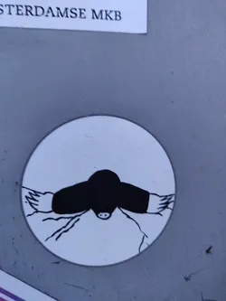 A round white sticker with a simple black and white drawing of a mole. The mole is depicted from above, with its arms outstretched and claws visible. The style is minimalist and somewhat cartoonish.