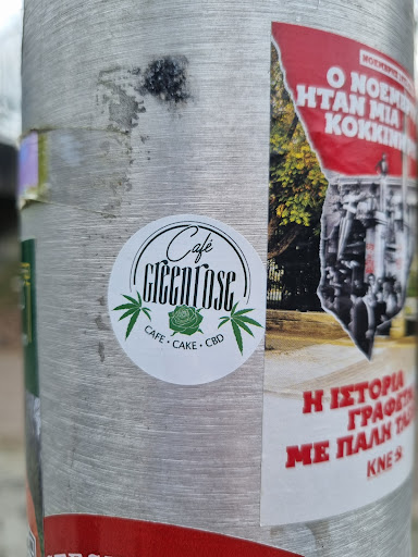 Street sticker Amsterdam MOEMBPHK o NOEM HTAN MIA KOKKINHA Caf&eacute; ST GIGGAROSE CAFE CAKE CBD H IETOPIA ГРАФЕТА ME ПАЛН TAS KNE