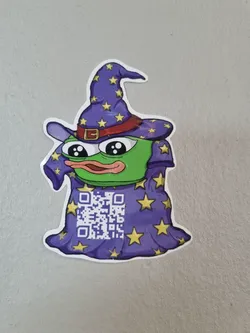 Street sticker A cute sticker featuring Pepe the Frog dressed as a wizard.  The wizard's robe has a QR code on it.