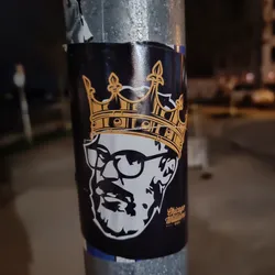 Street sticker A sticker featuring a stylized portrait of Walter White from Breaking Bad wearing a crown. The background is black, and the crown and Walter White are in gold and white respectively. The text 'Chicago Williamson' is visible at the bottom right corner.