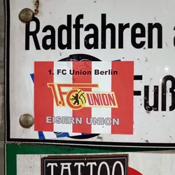 Street sticker A sticker featuring the logo of 1. FC Union Berlin, a German football club. The sticker has red and white vertical stripes with the club's logo and name. The text "Eisern Union" is also visible at the bottom. 