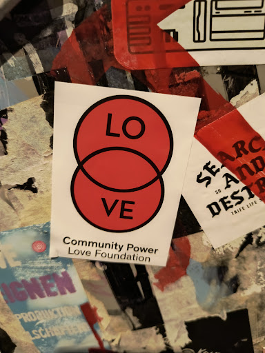 Street sticker Berlin LO VE SEARC AND SO E Community Power DESTR e Love Foundation TRIFE LIFE IGNEN PRODUKTION LSCHAFTEN