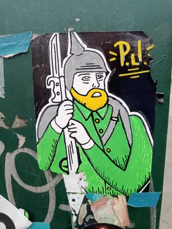 Street sticker A hand-drawn style sticker of a soldier in a green jacket and helmet, carrying a rifle. The style is simplistic with bold outlines and flat colors.  Yellow text above the soldier's head reads "P.L.I."
