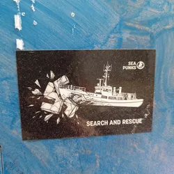 Street sticker Black and white sticker depicting a ship breaking ice. The text "SEARCH AND RESCUE" is at the bottom and "SEA PUNKS" logo is at the top right corner.
