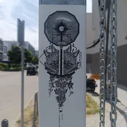 Black and white sticker featuring a geometric design with two fox heads, a compass-like element, and floral details. The artist's signature, Fritz_kraut, is visible in the corner. 