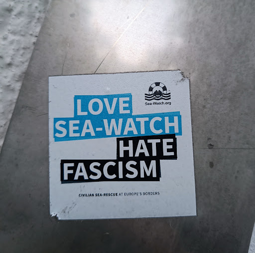 Street sticker Berlin LOVE Sea-Watch.org SEA-WATCH HATE FASCISM CIVILIAN SEA-RESCUE AT EUROPE'S BORDERS