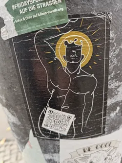 Street sticker A dark-colored sticker features a minimalist line drawing of a muscular male figure, reminiscent of a classical statue.  The figure is backlit by a stylized sunburst. A QR code is located near the bottom of the sticker.