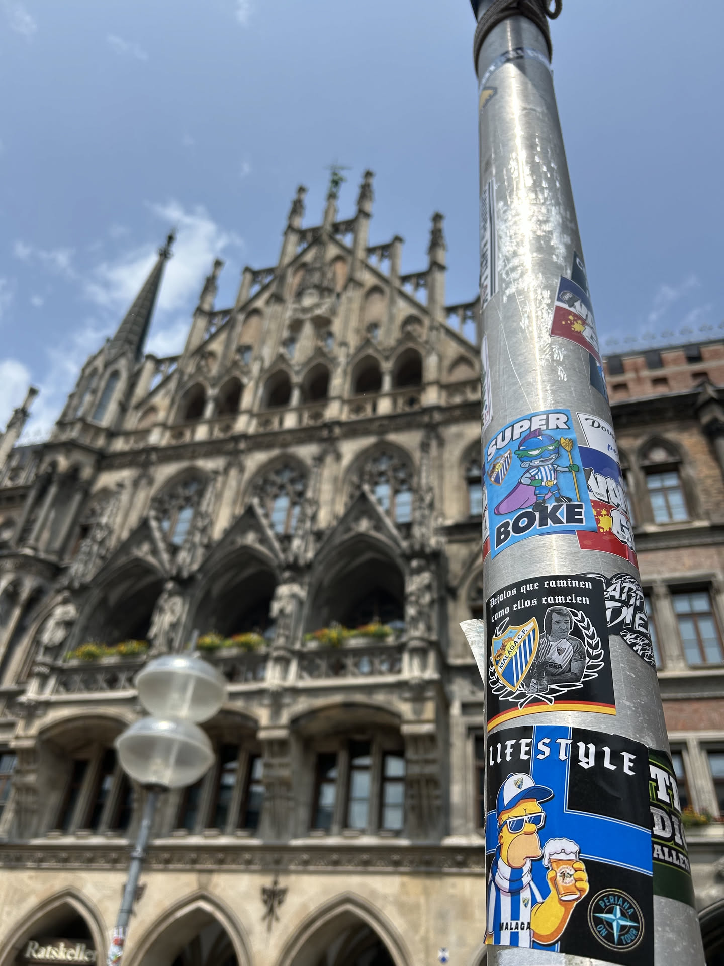 A vibrant, cartoon-style sticker featuring a superhero-like character. The character wears a blue and white striped jersey, a green mask, a green cape, and a blue helmet. He holds a yellow staff topped with a small trophy and a football under his arm. The background is a bright blue, and the text 'SUPER BOKE' is prominently displayed in yellow and white lettering with blue outlines.