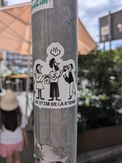 Street sticker A die-cut sticker depicting three stylized black and white characters interacting over coffee. Above them is a steam icon, and below is the Romanian text 'NE ȘTIM DE LA STEAM'.