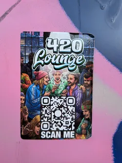 Street sticker A vibrant, rectangular sticker with rounded corners, featuring a detailed cartoon illustration of a lively social gathering. The central image depicts a diverse group of smiling and laughing individuals, mostly young adults, in what appears to be an indoor lounge setting with large windows in the background. Many characters are holding what look like joints or pipes, with green smoke wafting around them, indicating a cannabis-friendly environment. The color palette is rich and varied, with blues, greens, purples, and oranges prominent in the characters' clothing and the overall scene. At the top, the text '420 Lounge' is displayed in a stylized, bubbly font with white, light blue, and green outlines. A large, prominent QR code is situated in the lower center of the sticker, with the words 'SCAN ME' directly below it in white capital letters.
