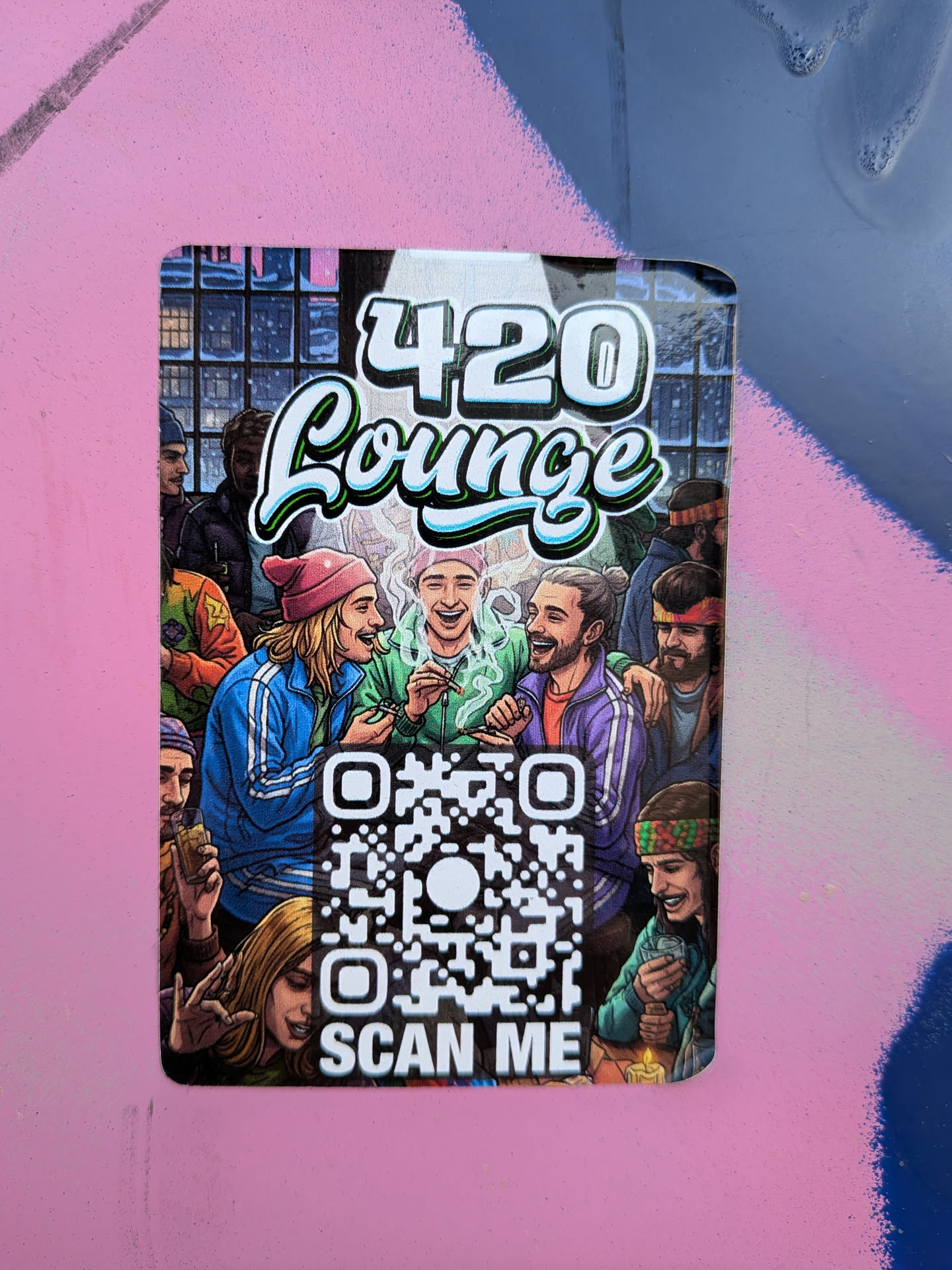 A vibrant, rectangular sticker with rounded corners, featuring a detailed cartoon illustration of a lively social gathering. The central image depicts a diverse group of smiling and laughing individuals, mostly young adults, in what appears to be an indoor lounge setting with large windows in the background. Many characters are holding what look like joints or pipes, with green smoke wafting around them, indicating a cannabis-friendly environment. The color palette is rich and varied, with blues, greens, purples, and oranges prominent in the characters' clothing and the overall scene. At the top, the text '420 Lounge' is displayed in a stylized, bubbly font with white, light blue, and green outlines. A large, prominent QR code is situated in the lower center of the sticker, with the words 'SCAN ME' directly below it in white capital letters.