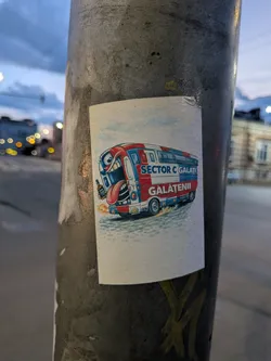 Street sticker A rectangular sticker featuring a cartoon monster bus in red, white, and blue. The front of the bus is a monster face with a large open mouth, tongue sticking out, and a hand holding a bottle. The side reads 'SECTOR C GALAȚI' and 'GĂLĂȚENII'.