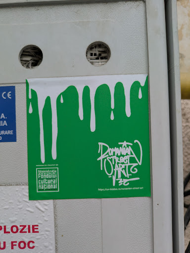 This sticker features a green background with white, dripping paint-like design at the top. On the lower right, the text "Romanian Street Art" is written in an artistic font. There is a website URL printed below the text and to the left is a logo for Administrația Fondului Cultural Național.