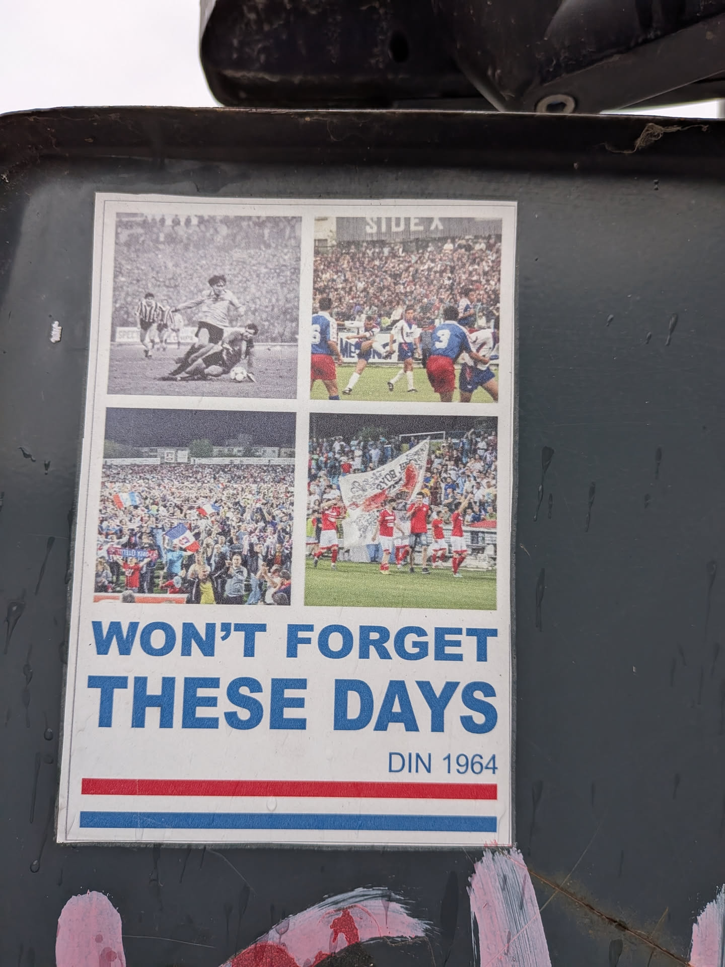 A rectangular sticker featuring four photographic panels of historic football matches and cheering crowds. Below the images, bold blue text reads 'WON'T FORGET THESE DAYS' and 'DIN 1964', accented by red and blue stripes at the bottom.