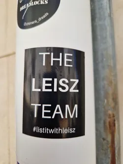 Street sticker Black and white sticker with the text "THE LEISZ TEAM" and the hashtag #listitwithleisz.