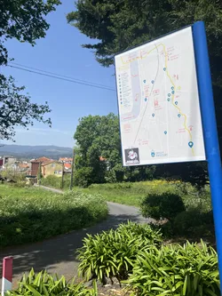 Street sticker The sticker is square-shaped with a black border, featuring a stylized, somewhat aggressive figure in profile, facing left. The figure has a dark, possibly black, face with a white outline, wearing a red bandana over their mouth and nose. A white eye is visible. The figure's left arm is raised, forming a fist, also in black with a white outline. Below the figure, in a white banner with a black outline, is the text "REBELIÓN ROJIBLANCA" in black capital letters. The overall color scheme is stark black, white, and red, with the background of the figure being white.