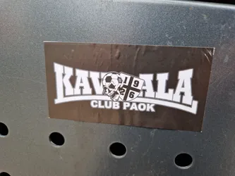 Black and white sticker with the text KAVALA CLUB PAOK. It features a skull with a soccer ball and a crest.