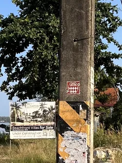 A square sticker with a red border, featuring the word 'BAYERN' in white stylized text within a red oval banner at the top. Below the text, the sticker displays a distinctive pattern of alternating white and red diamonds, arranged in a checkerboard style. The overall design is reminiscent of the Bavarian flag or coat of arms, set against a white background for the text and a red background for the diamond pattern.