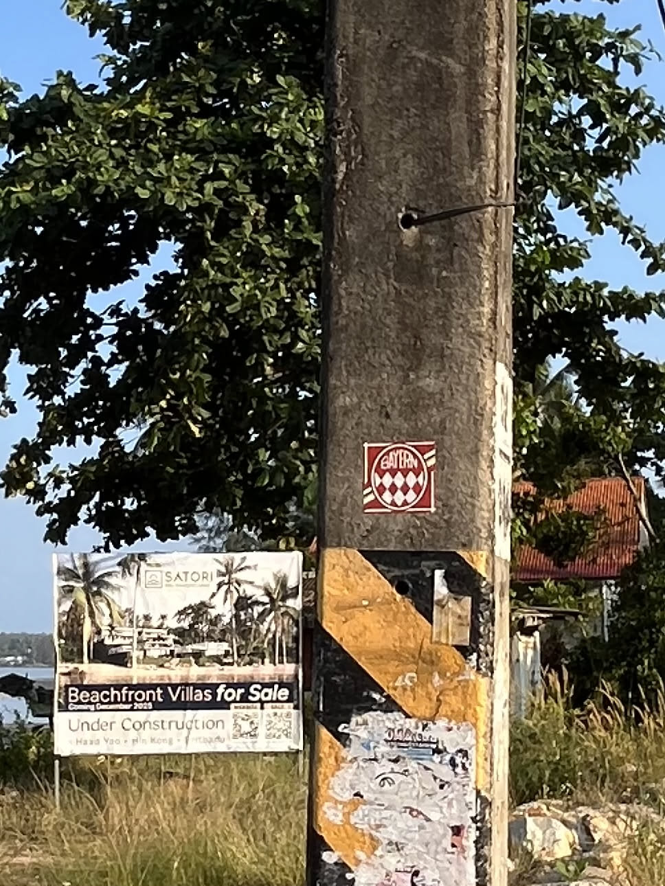 A square sticker with a red border, featuring the word 'BAYERN' in white stylized text within a red oval banner at the top. Below the text, the sticker displays a distinctive pattern of alternating white and red diamonds, arranged in a checkerboard style. The overall design is reminiscent of the Bavarian flag or coat of arms, set against a white background for the text and a red background for the diamond pattern.