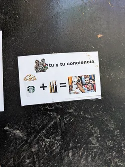 This sticker uses images and an equation symbol to deliver its message. In the top right corner, the text reads: 'tu y tu conciencia'. The math problem features: a Starbucks logo followed by plus bullets is equal to the image of a man holding a dead or injured person up in the air.
