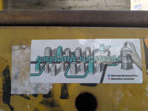 The sticker features a graphic of city buildings connected by a blue line with the words 'ALTERNATIVE-BUCHAREST .COM' and a hand spraying a can of paint. It also features social media icons for Facebook and Instagram.