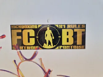 Street sticker A yellow and black kickboxing club sticker with the logo FCBT, the city Pontoise and the text "Kickboxing" and "K1 rules".