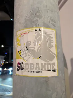 Street sticker Square sticker showing a stylized grey horse flexing its bicep next to a coat of arms shield. Features the text 'SÜDBANDE STUTTGART' in bold lettering at the bottom.