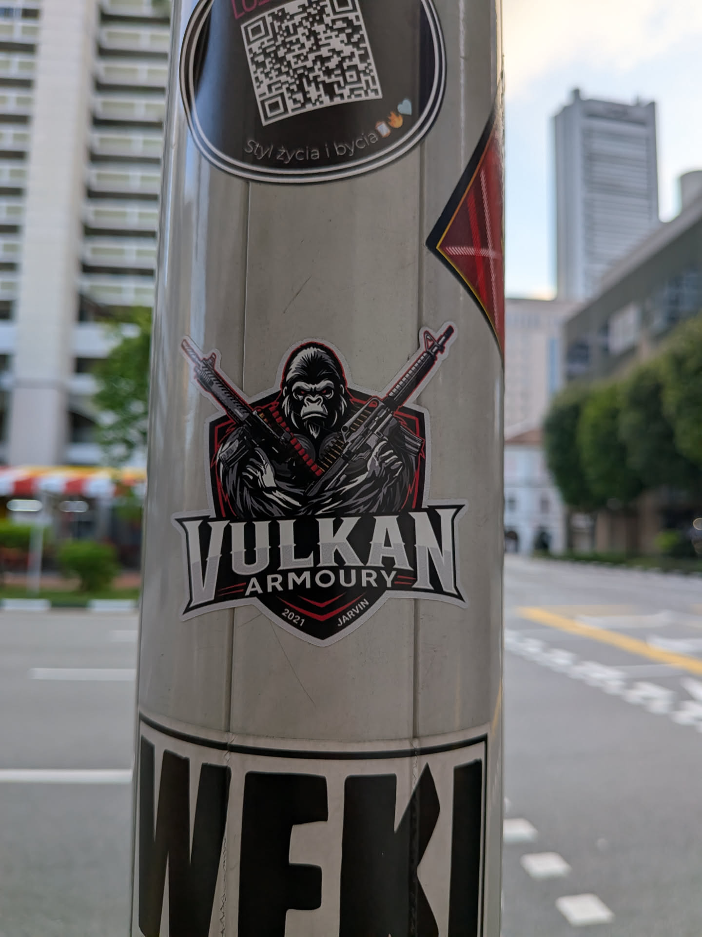 A die-cut sticker depicting a fierce gorilla holding two crossed rifles against a red and black shield. The text 'VULKAN ARMOURY' is displayed below in a bold, stylized font, flanked by '2021' and 'JARVIN'.