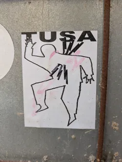 This sticker features a stylized drawing of a person with lightning bolts striking through their body. The drawing is in black lines with pink shading. The word "TUSA" is printed above the figure in black, bold letters.