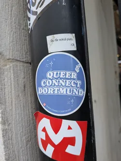 Street sticker A round blue sticker featuring the text 'QUEER CONNECT DORTMUND' in a white, bubbly retro font. It is decorated with small white sparkle graphics and includes an Instagram handle at the bottom.