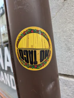 Street sticker A round yellow sticker designed to look like a taco. The center features the text 'NO PARTY' on the top half and 'NO TACO' upside down on the bottom half. The outer edge is decorated with illustrated taco ingredients including lettuce, tomatoes, and cheese.