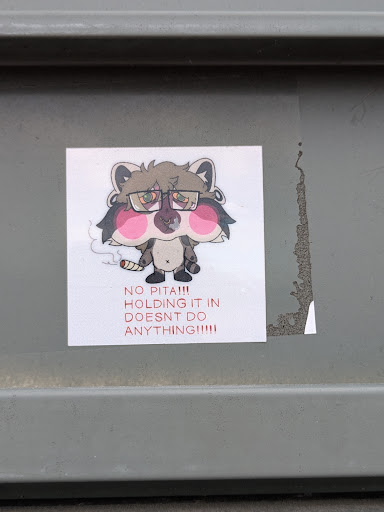 This sticker shows a cartoon raccoon character with glasses, blushy cheeks, and a bored expression. It's holding a lit cigarette in its hand. Below the illustration, there's text in red.