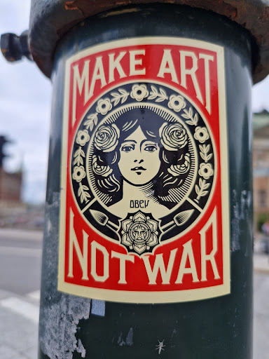 Street sticker Stockholm MAKE ART OBEN NOT WAR